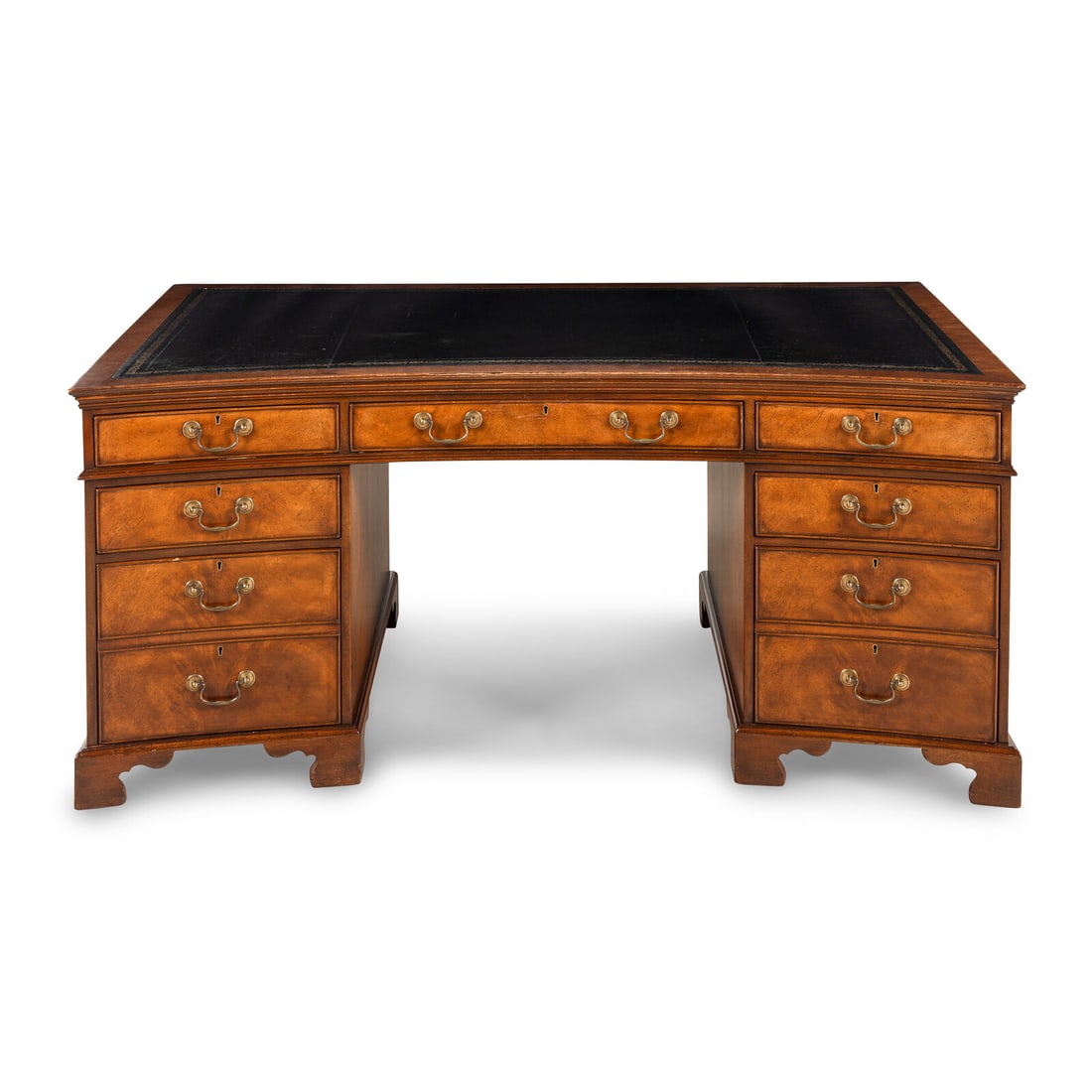 A George III Style Mahogany Pedestal Desk: A George III Style Mahogany Pedestal Desk H.L. Holland Designs, 20th Century Height 30 1/4 x width 66 x depth 38 1/2 inches. Property from a Distinguished Chicago Gold Coast Residence This lot is