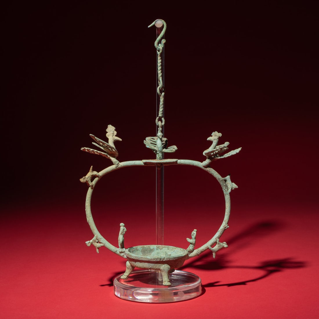 A Chinese Bronze 'Phoenix and Immortal' Hanging Oil Lamp, Eastern Han Dynasty (1 of 5)