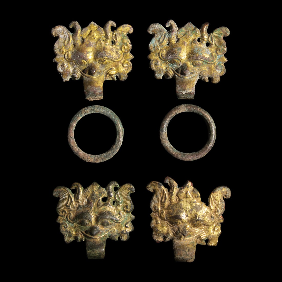 Two Pairs of Chinese Gilt Bronze 'Taotie Mask' Fittings, Han-Six Dynasties: Two Pairs of Chinese Gilt Bronze 'Taotie Mask' Fittings, Han-Six Dynasties 漢-六朝 銅鎏金饕餮紋輔首兩對 Han-Six Dynasties 