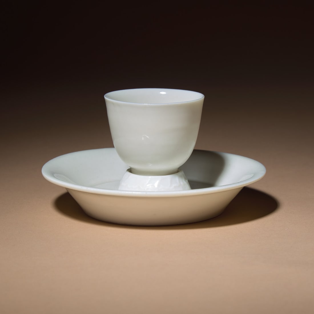 A Chinese Blanc-de-Chine Porcelain Cup and Associated Lotus Stand, 17th-18th Century: A Chinese Blanc-de-Chine Porcelain Cup and Associated Lotus Stand, 17th-18th Century 清早中期 德化白瓷茶杯與蓮花盞&#