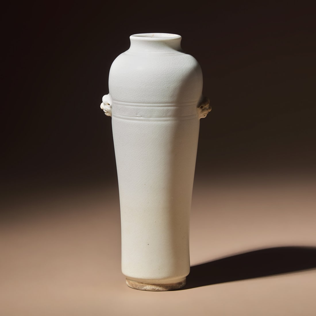 A Chinese Blanc-de-Chine Porcelain Sleeve Vase, 17th-18th Century: A Chinese Blanc-de-Chine Porcelain Sleeve Vase, 17th-18th Century 清早期 德化白瓷雙輔首耳弦紋筒瓶 17th-18th Ce
