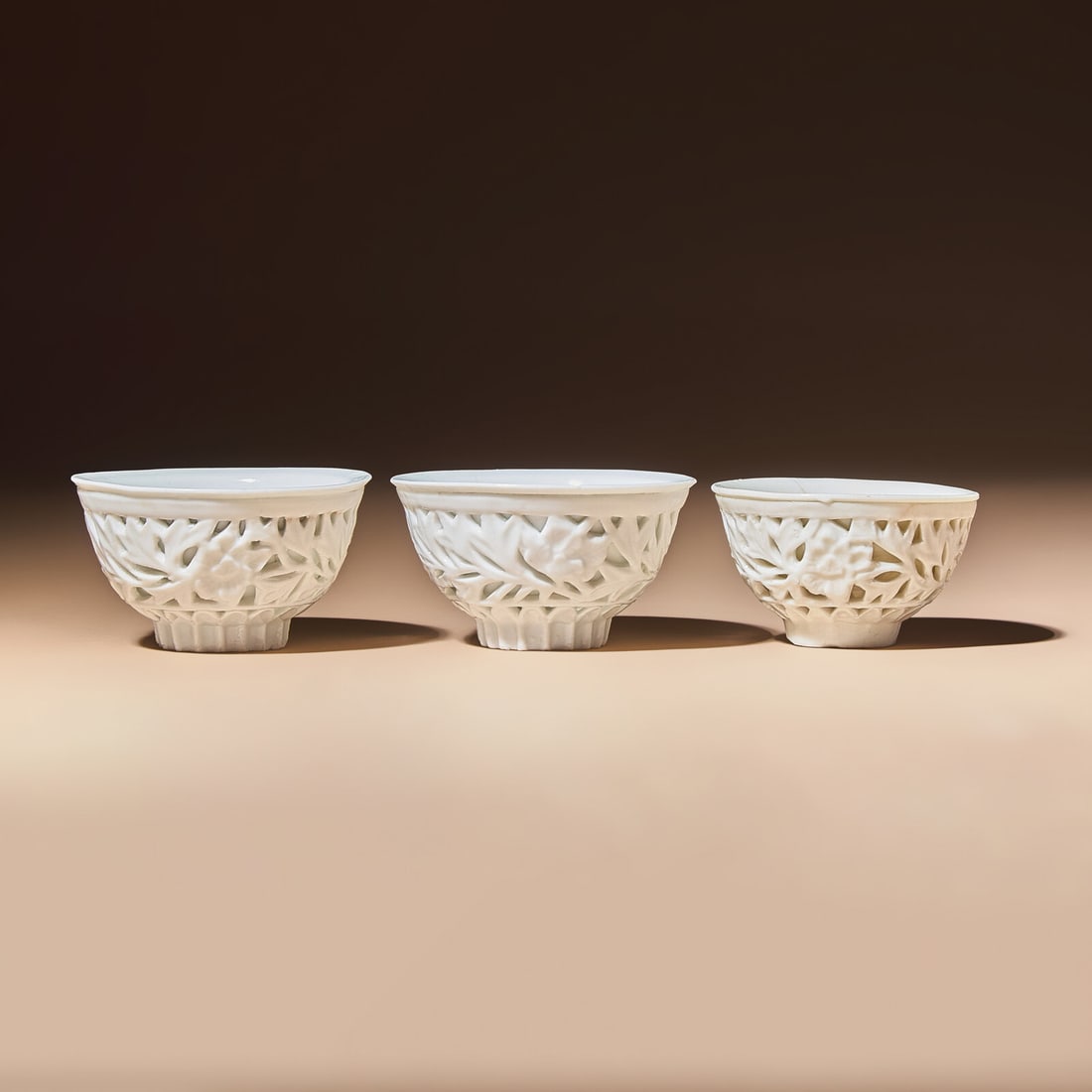 Three Chinese Blanc-de-Chine Porcelain Reticulated 'Floral' Cups, Mid 17th-Early 18th Century (1 of 4)