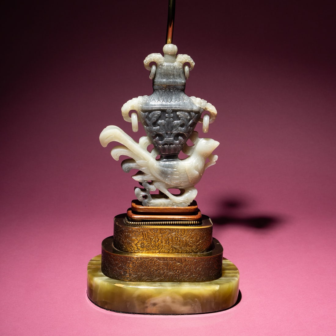 A Chinese Grey and White Jade 'Phoenix' Vase, Late Qing Dynasty: A Chinese Grey and White Jade 'Phoenix' Vase, Late Qing Dynasty 清晚期 灰白玉雕鳳凰寶瓶 Late Qing Dynasty Depicting a standing phoenix