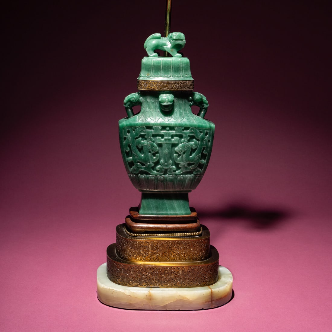 A Chinese Carved Aventurine Quartz ?Chilong? Covered Vase, 20th Century: A Chinese Carved Aventurine Quartz ‘Chilong’ Covered Vase, 20th Century 近代 東陵玉雕螭龍紋賞瓶 20th Century The mottled g