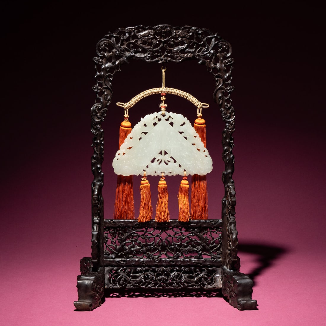 A Chinese White Jade Chime-Form Pendant, 18th/19th Century: A Chinese White Jade Chime-Form Pendant, 18th/19th Century 清中期 白玉罄 18th/19th Century The chime crafted from stone of an even tone and surmounted by a pair of 