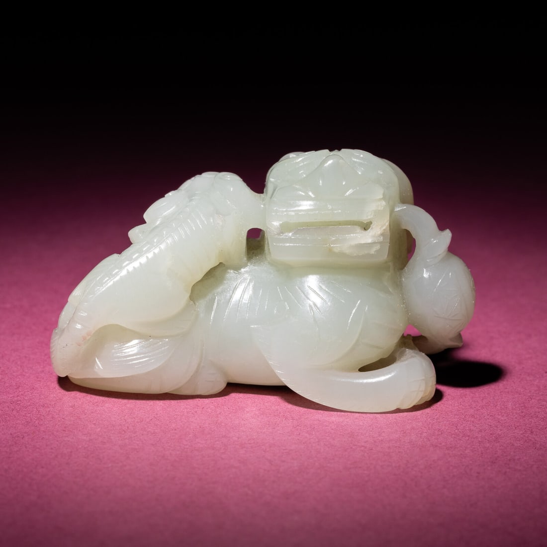 A Chinese Pale Celadon Jade Group of Fu Lions, Qing Dynasty: A Chinese Pale Celadon Jade Group of Fu Lions, Qing Dynasty 清 青白玉太獅少獅把件 Qing Dynasty (1644-1911) The larger beast recumbent with a