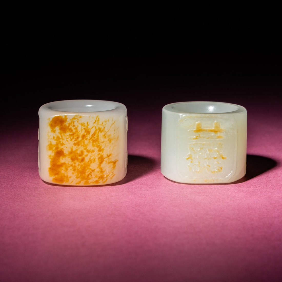 Two Chinese Jade Archer's Rings, 18th/19th Century: Two Chinese Jade Archer's Rings, 18th/19th Century 清中期 白玉留皮扳指兩枚 18th/19th Century The larger example, crafted from stone of