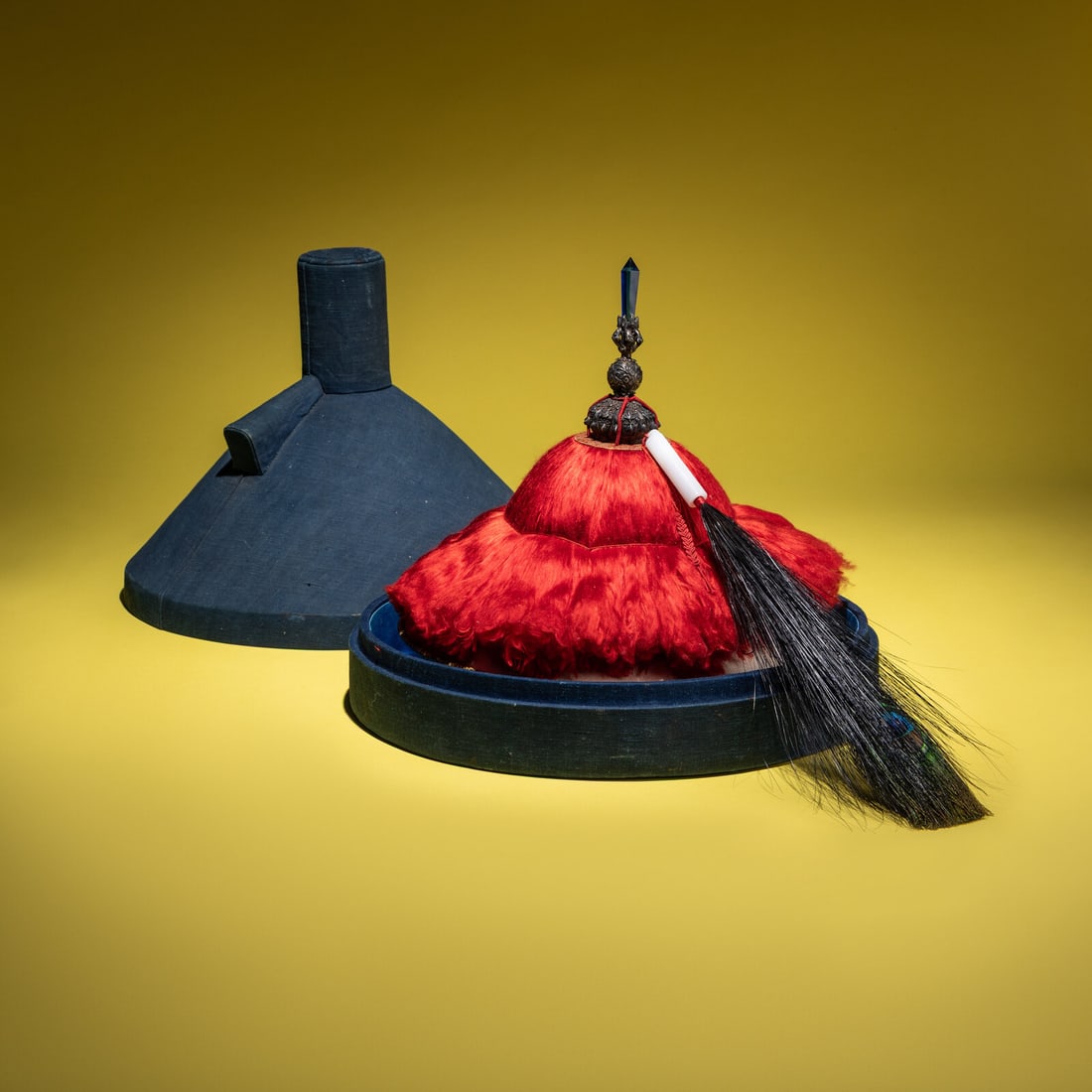A Chinese Red Silk Floss Mandarin's Summer Hat with a Single-Eyed Plume and an Original Hat Box,: A Chinese Red Silk Floss Mandarin's Summer Hat with a Single-Eyed Plume and an Original Hat Box, 18th/19th Century 清中期 三品夏朝冠配蓝