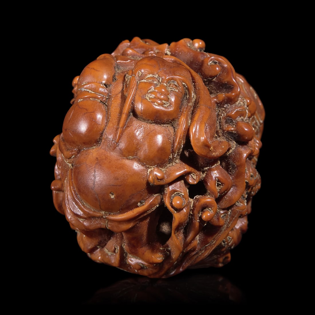 A Chinese Carved Luohan Walnut, 19th/Early 20th Century (1 of 5)