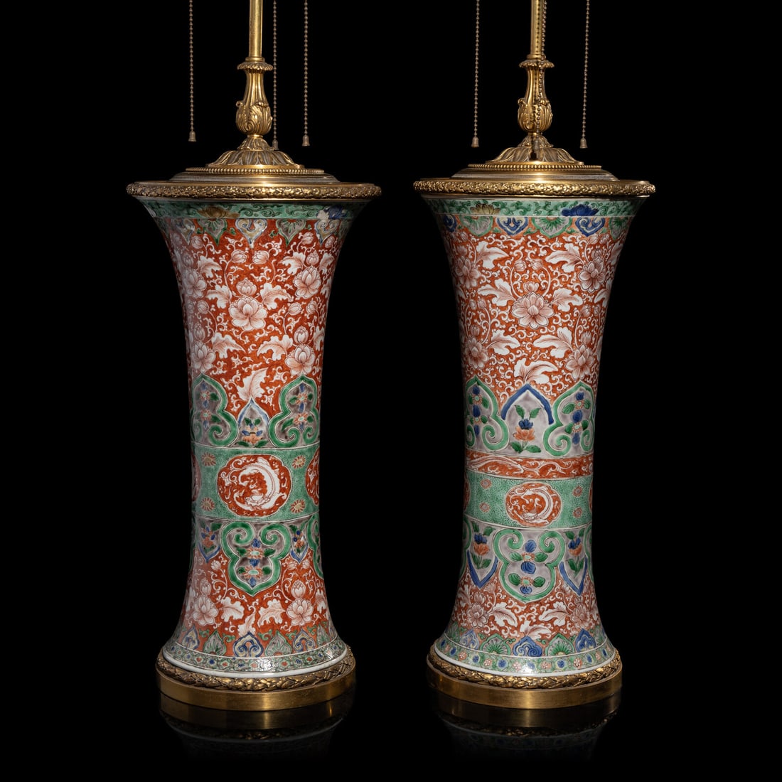 An Associated Pair of Chinese Famille Verte 'Flowers' Porcelain Gu Vases, 18th/19th Century: An Associated Pair of Chinese Famille Verte 'Flowers' Porcelain Gu Vases, 18th/19th Century 清中期 五彩纏枝花卉紋觚一對 18