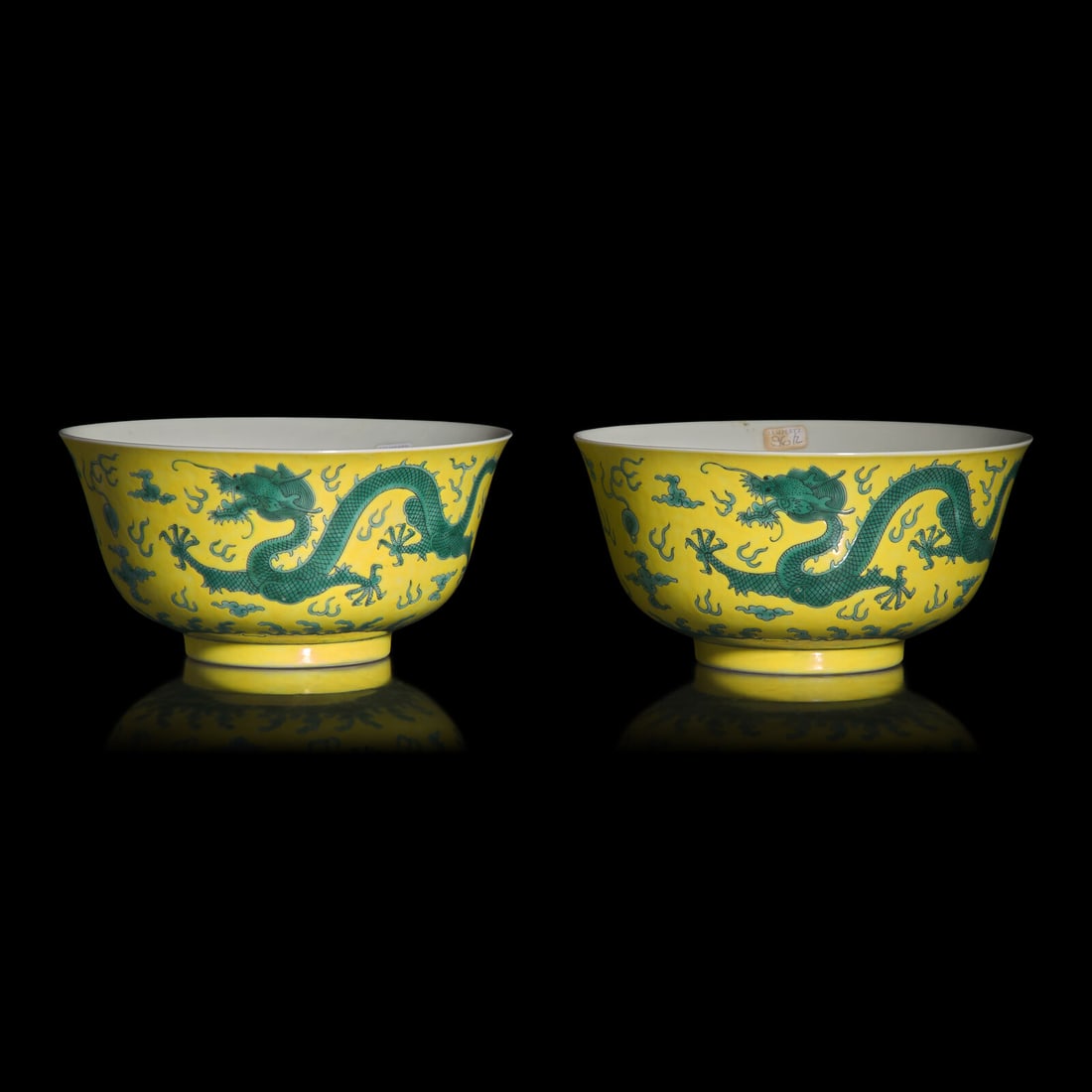 A Pair of Chinese Green Enameled Yellow Ground 'Dragon' Bowls, Guangxu Mark and of the Period: A Pair of Chinese Green Enameled Yellow Ground 'Dragon' Bowls, Guangxu Mark and of the Period 清光緒 黃地綠彩雲龍紋碗一對 