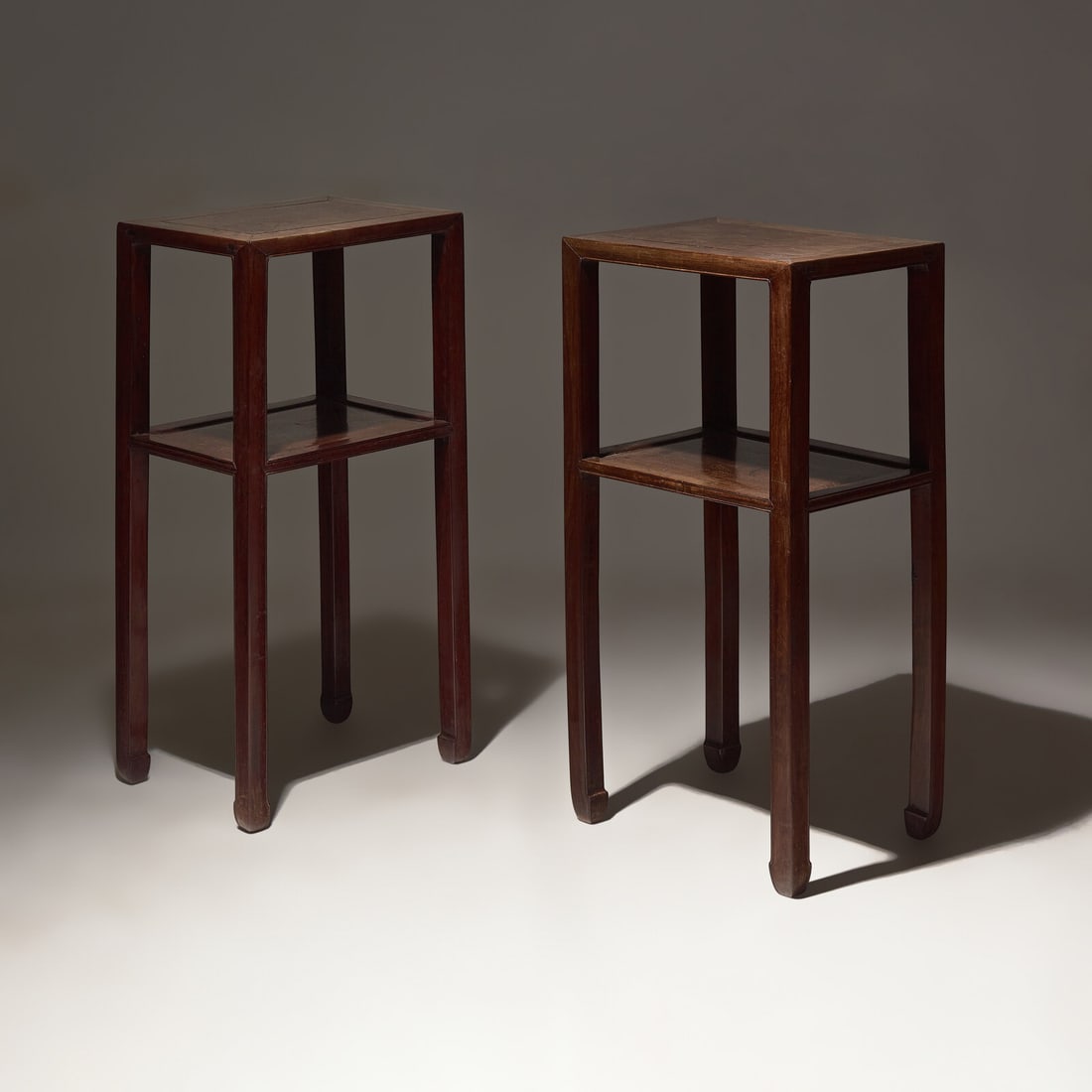 A Pair of Chinese Hardwood, Possibly Huanghuali, Stands, Qing Dynasty, 18th Century: A Pair of Chinese Hardwood, Possibly Huanghuali, Stands, Qing Dynasty, 18th Century 清中期 或爲黃花梨邊几一對 18th Century Of wa