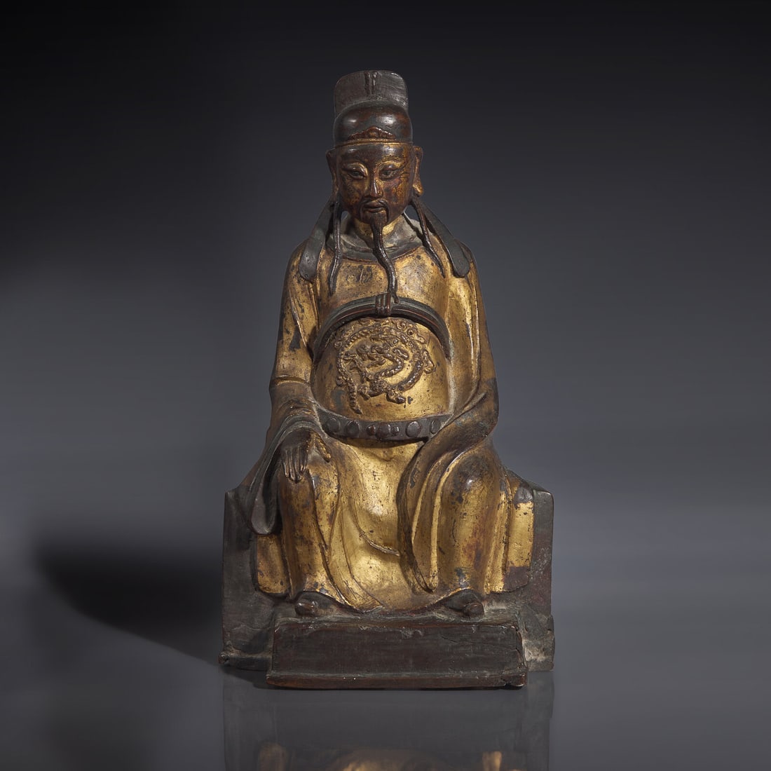A Chinese Gilt-Lacquered Bronze Figure of a Seated Deity, Ming Dynasty (1 of 4)