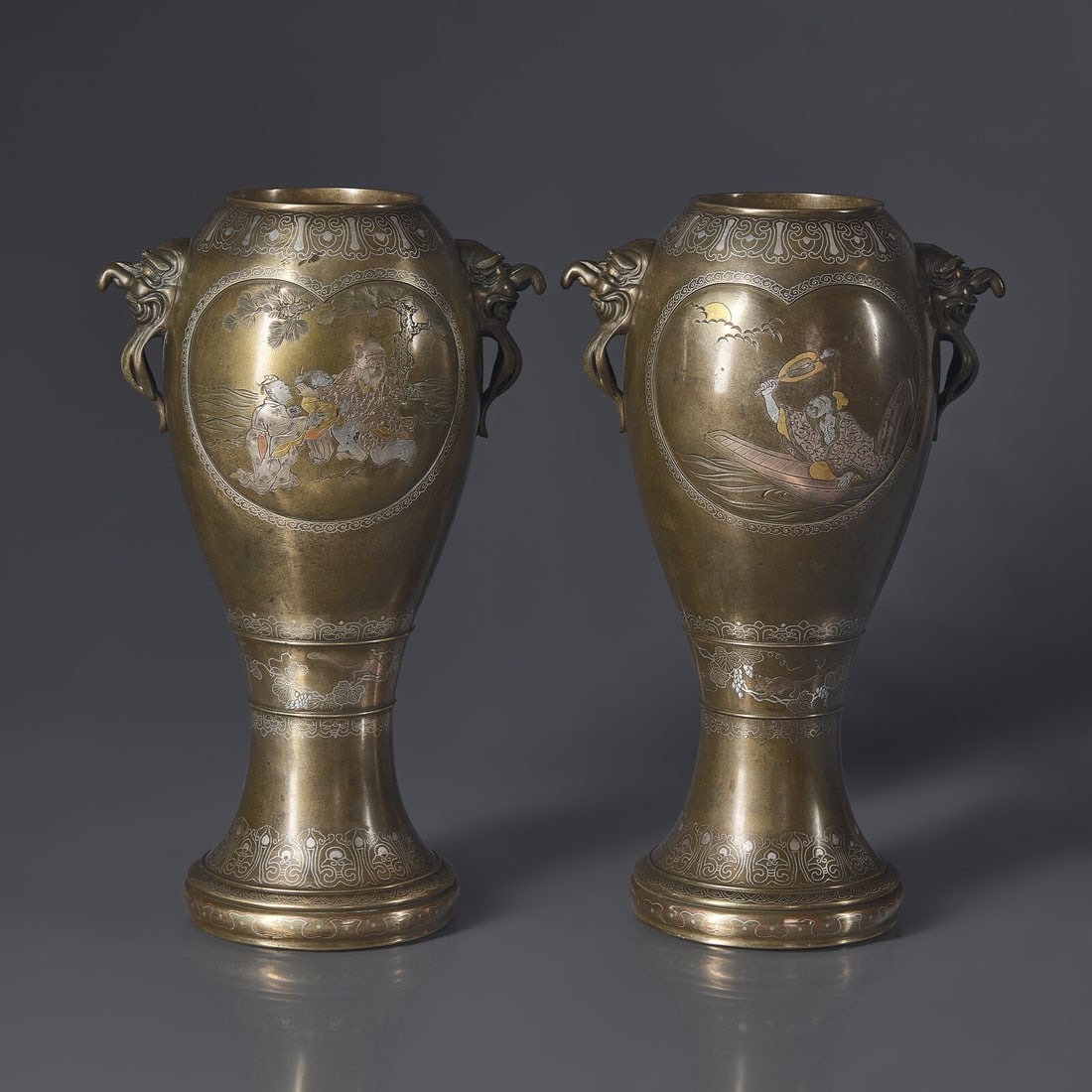 A Pair of Japanese Kaga Style Mixed Metal-Inlaid Bronze Vases, Meiji Period: A Pair of Japanese Kaga Style Mixed Metal-Inlaid Bronze Vases, Meiji Period 日本明治時期 銅瓶一對 Meiji Period Heavily cast, of attenuated f