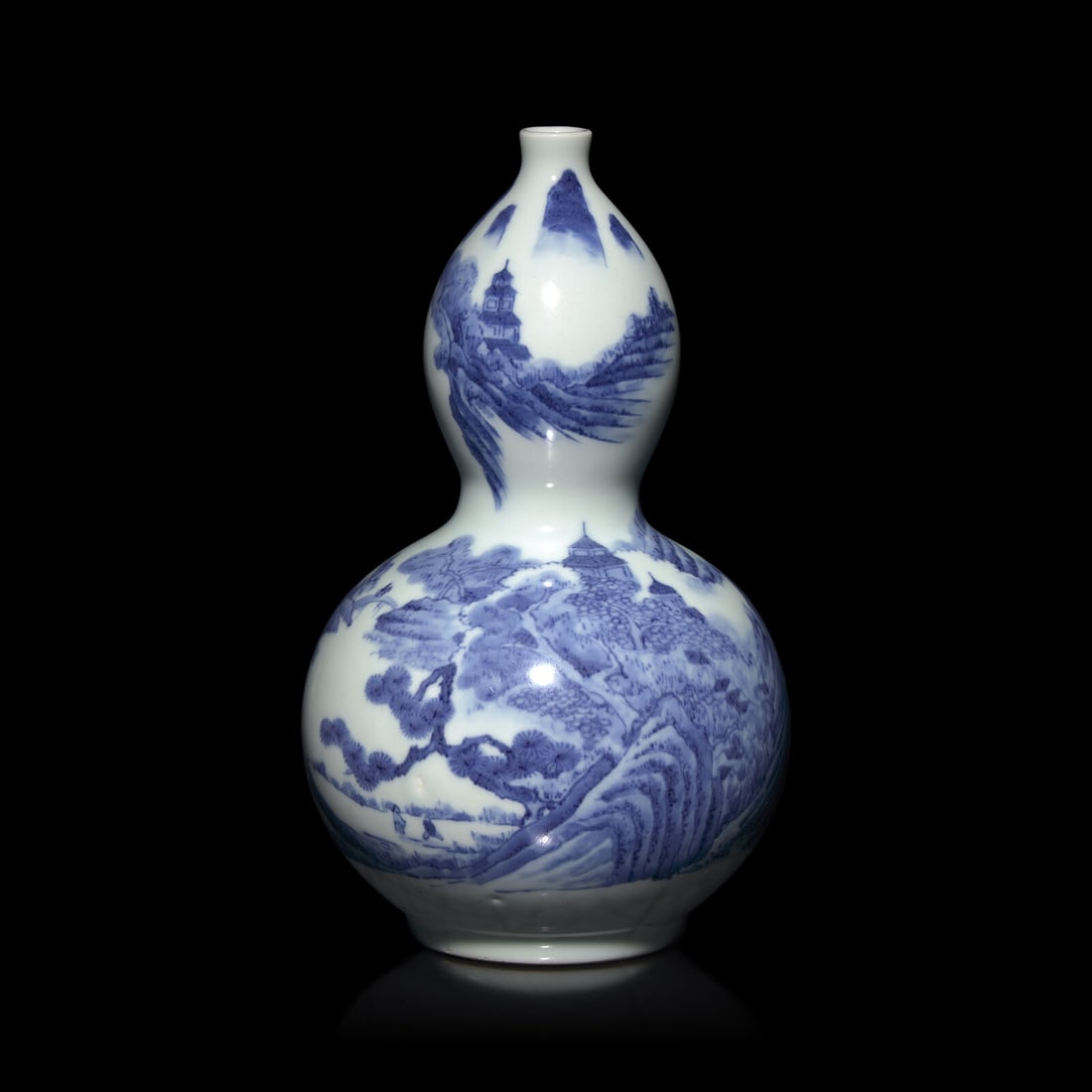 A Japanese Hirado Blue and White Double-Gourd Vase, Edo to Early Meiji Period: A Japanese Hirado Blue and White Double-Gourd Vase, Edo to Early Meiji Period 日本江戶-明治早期 平戶燒青花山水