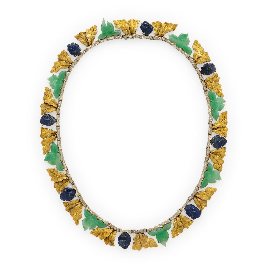 Buccellati, Yellow Gold, Carved Jade, and Carved Sapphire Necklace: Buccellati, Yellow Gold, Carved Jade, and Carved Sapphire Necklace In a foliate design, set with carved sapphires weighing approximately 29.20 carats total, carved jade weighing approximately 29.33 ca