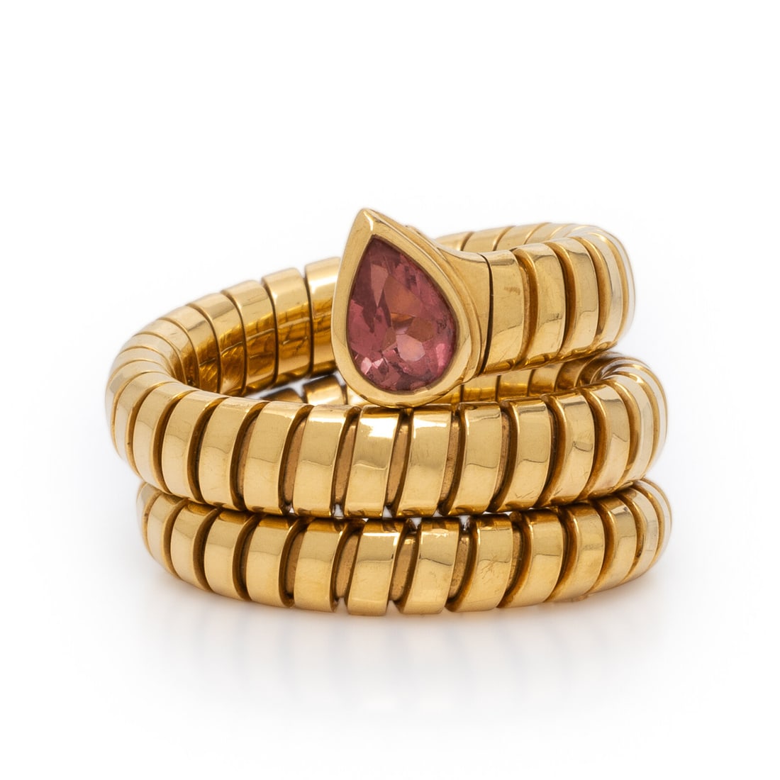 Bulgari, 'Serpenti', Pink Tourmaline and Yellow Gold Tubogas Ring: Bulgari, 'Serpenti', Pink Tourmaline and Yellow Gold Tubogas Ring In a flexible wrap design, set with a pear shape pink tourmaline. Mounted in 18 karat yellow gold. Ring size 7. Stamp: BVLGARI (Italia