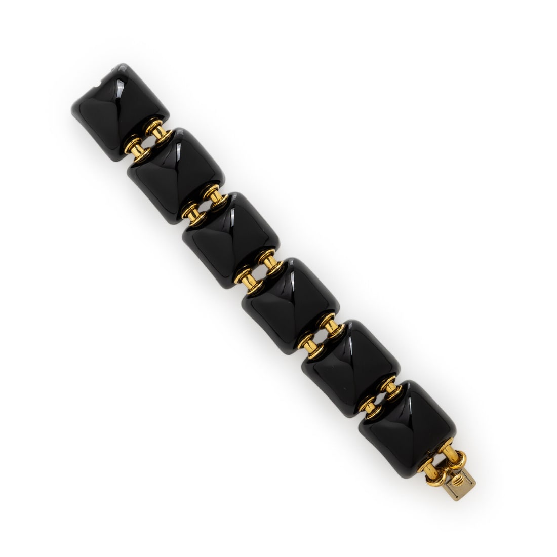 Seaman Schepps, Carved Onyx and Yellow Gold Bracelet: Seaman Schepps, Carved Onyx and Yellow Gold Bracelet Featuring links of carved pyramidal onyx, each measuring approximately 23.85 x 23.85x 11.10 mm. Mounted in 18 karat yellow gold. 6 1/2 inches long.