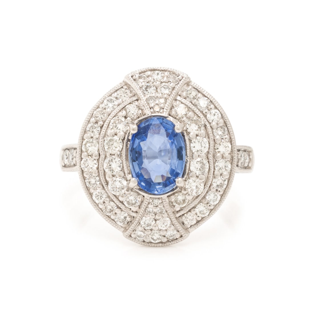 Oscar Friedman, Sapphire, Diamond, and Platinum Ring: Oscar Friedman, Sapphire, Diamond, and Platinum Ring Featuring an oval sapphire weighing approximately 1.17 carats, with round brilliant cut diamonds weighing approximately 0.76 carat total. Mounted i