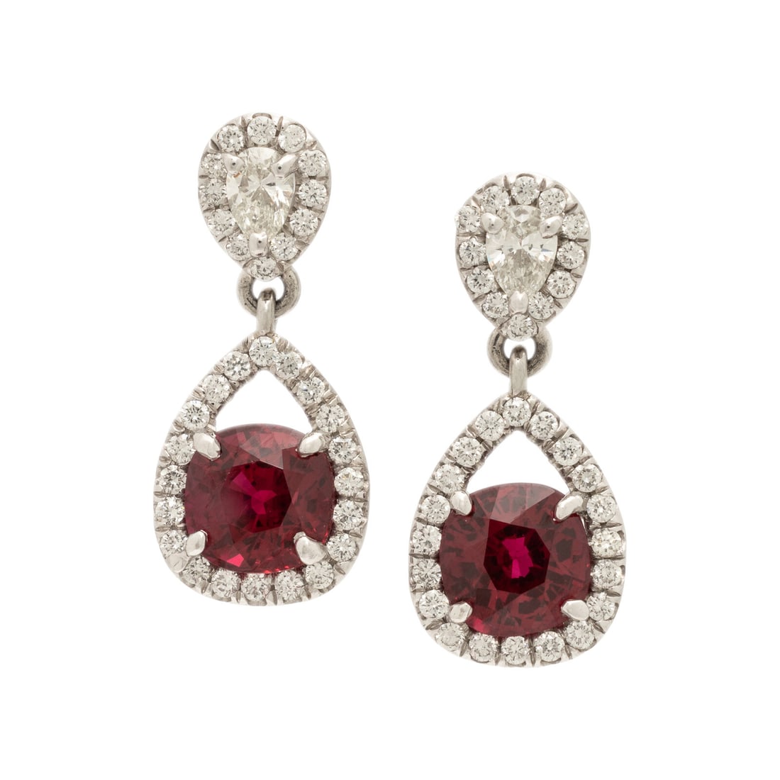 Burmese Ruby, Diamond, and Platinum Earrings: Burmese Ruby, Diamond, and Platinum Earrings Featuring two cushion cut Burmese rubies weighing approximately 1.65 and 1.70 carats respectively by formula, mounted in a drop design with round brilliant