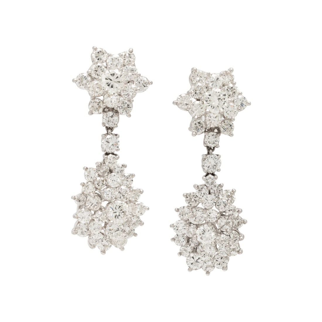 Diamond and Platinum Pendant Earrings: Diamond and Platinum Pendant Earrings Featuring round brilliant cut diamonds weighing approximately 9.50 - 10.50 carats total. Mounted in platinum. 1 3/4 inches long. Gross weight: 14.35 dwt.