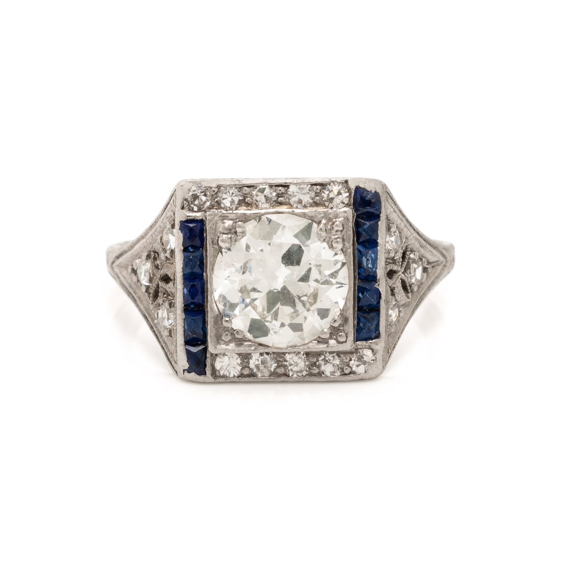 Diamond and Synthetic Sapphire Ring: Diamond and Synthetic Sapphire Ring Featuring an old European cut diamond weighing approximately 1.40 carats, single cut diamonds weighing approximately 0.30 carat total, and calibré-cut synthetic sa