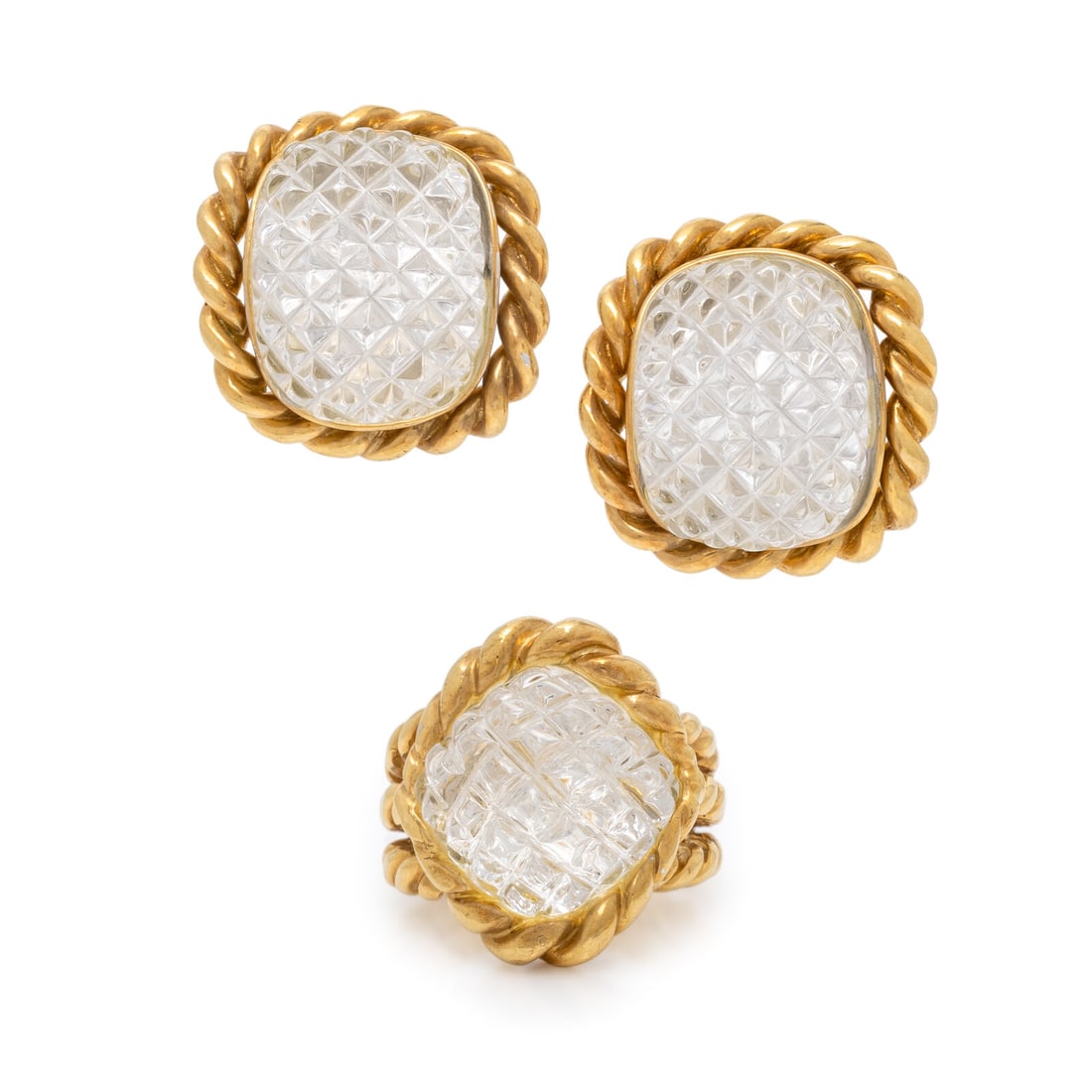 Sabbadini, Carved Rock Crystal and Yellow Gold Ring and Earrings: Sabbadini, Carved Rock Crystal and Yellow Gold Ring and Earrings Including a ring and a pair of earrings, both set with carved rock crystal quartz and accented with rope-twist motif edges. Mounted in 