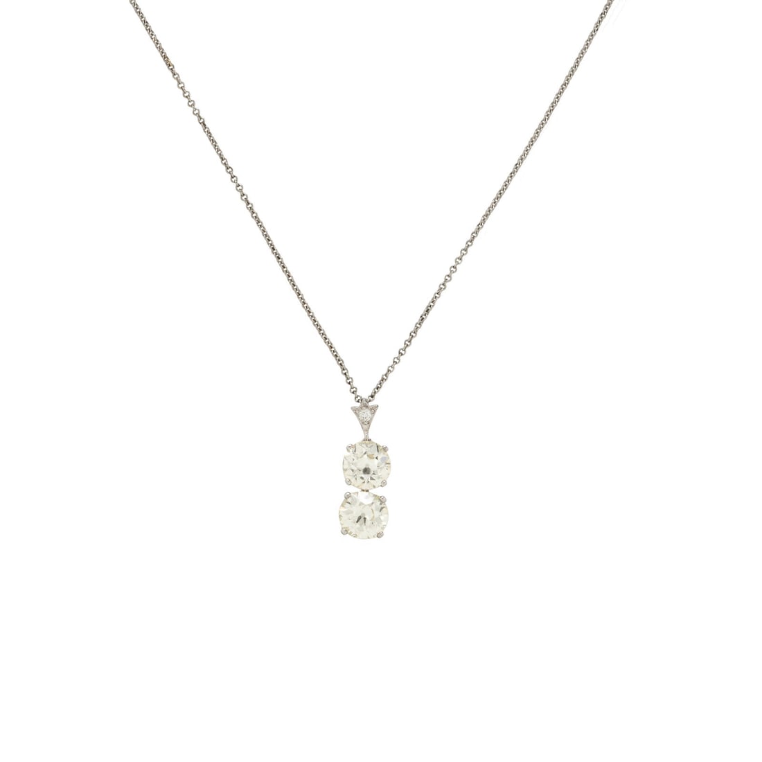 Diamond Pendant Necklace: Diamond Pendant Necklace Featuring two old European cut diamonds weighing approximately 1.50 carats and 1.60 carats respectively, with an additional old European cut diamond set in the bale. Mounted