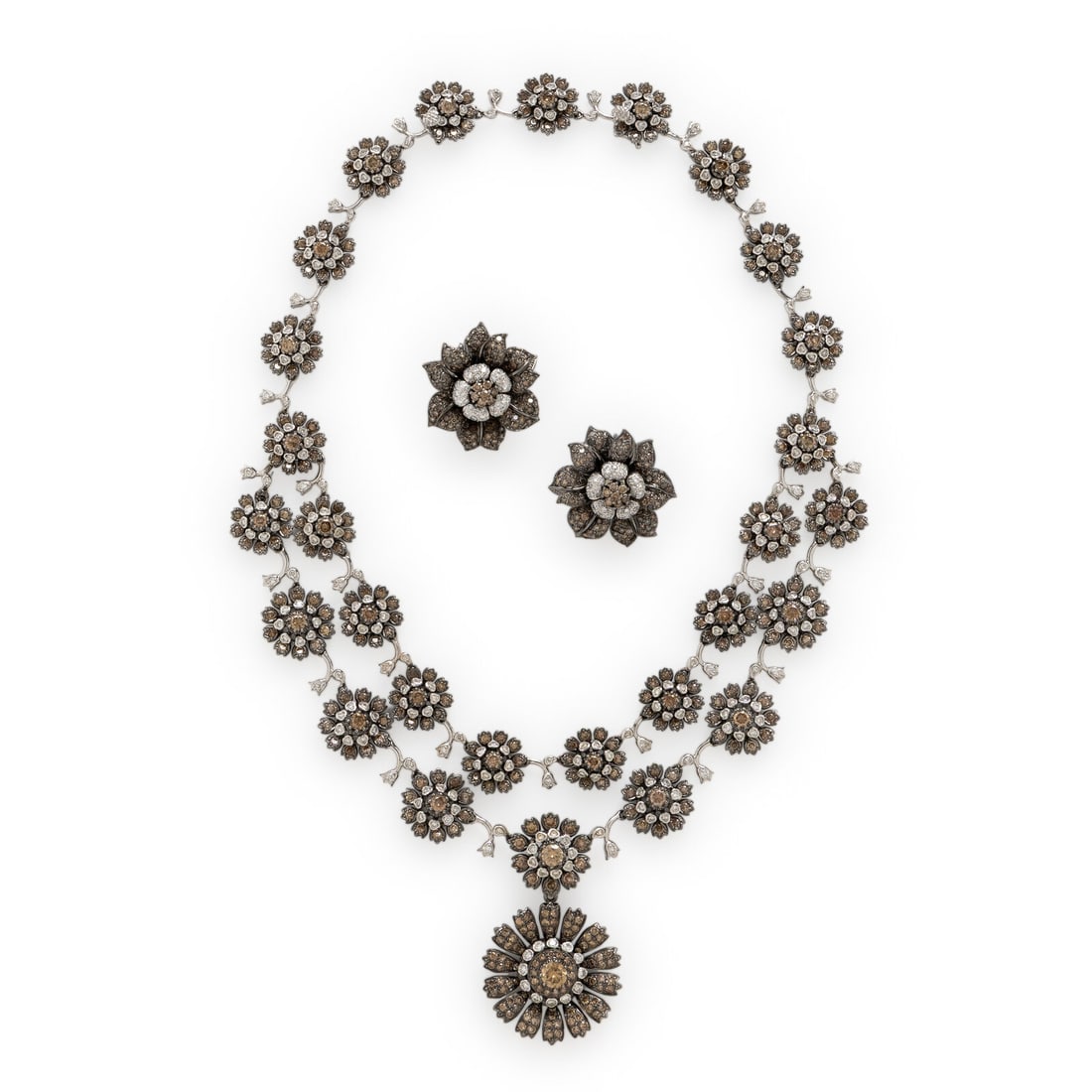 Colored Diamond and Diamond Flower Necklace and Earrings Set: Colored Diamond and Diamond Flower Necklace and Earrings Set Composed of floral links, the necklace set with round brilliant cut brown diamonds weighing approximately 15.80 carats total and round