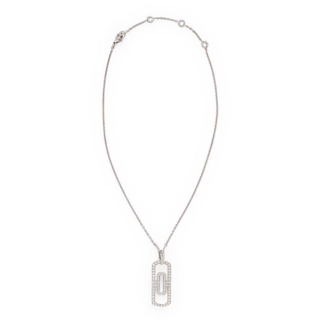 Bulgari, White Gold and Diamond 'Parentesi' Pendant Necklace: Bulgari, White Gold and Diamond 'Parentesi' Pendant Necklace In a geometric design, the pendant set with round brilliant cut diamonds weighing approximately 1.20 carats total. Mounted in 18 karat