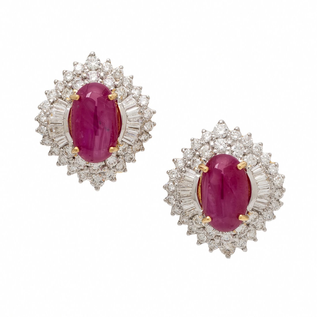 Ruby and Diamond Earrings: Ruby and Diamond Earrings Set with oval cabochon rubies weighing approximately 3.70 and 3.85 carats respectively by formula, accented by round brilliant and tapered baguette cut diamonds weighing appr