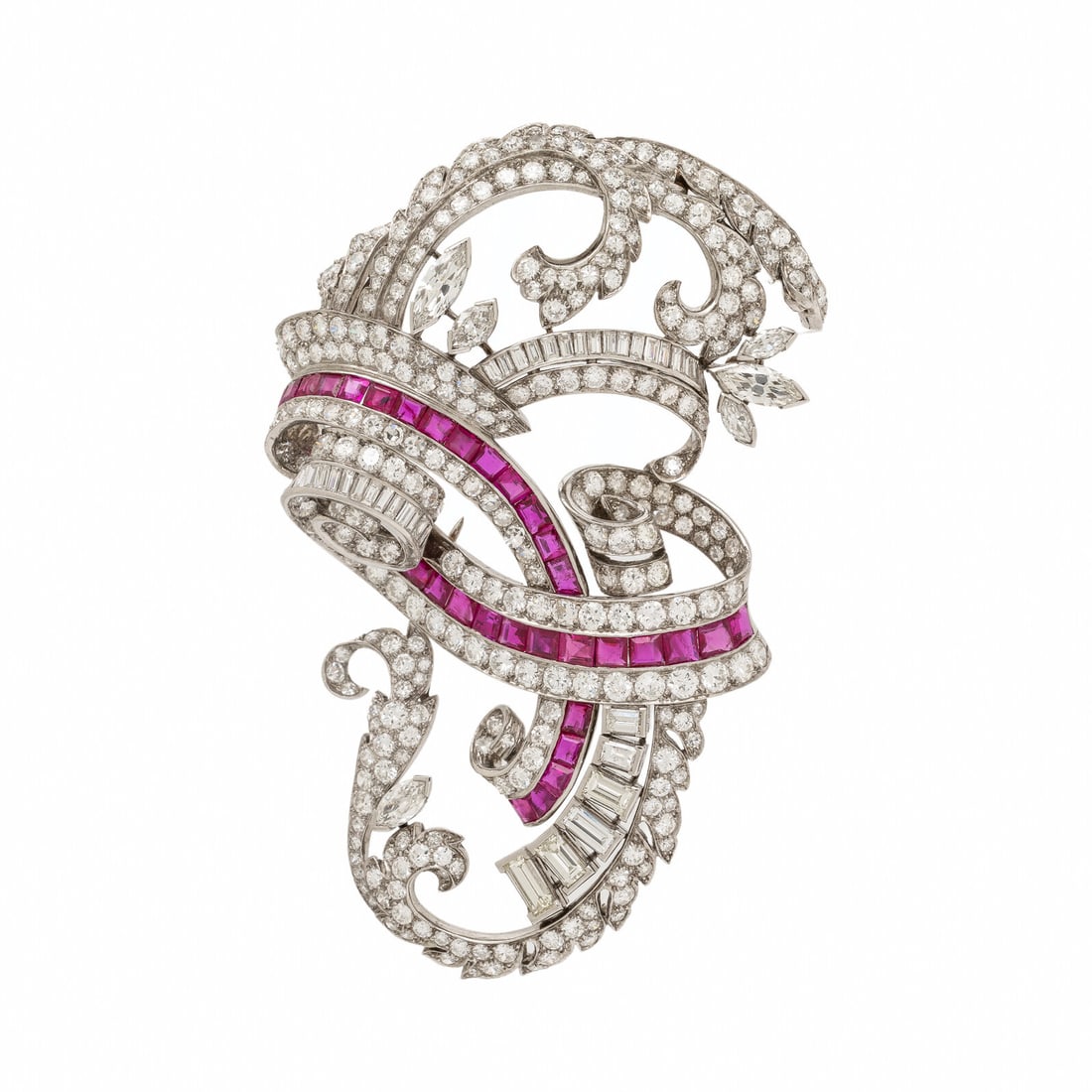 Diamond, Ruby, and Platinum Brooch: Diamond, Ruby, and Platinum Brooch Featuring baguette, single, round brilliant, and marquise cut diamonds weighing approximately 11.00 - 13.00 carats total, and calibré-cut rubies. Mounted in