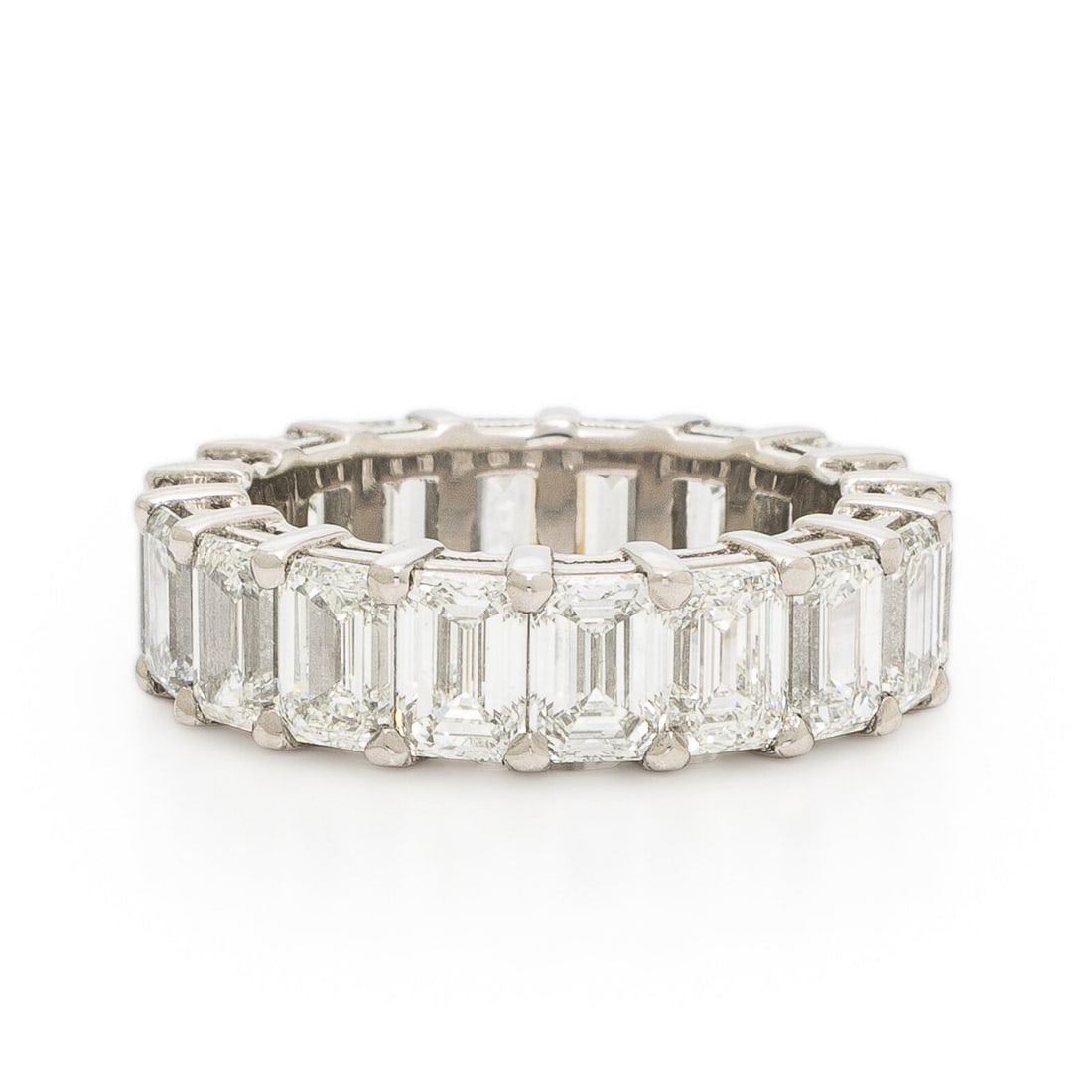 Diamond and Platinum Eternity Band: Diamond and Platinum Eternity Band Featuring emerald cut diamonds weighing approximately 9.16 carats total. Mounted in platinum. Ring size 6 1/2. Stamp: PLAT D9.16. Gross weight: 6.20 dwt. Accompanied