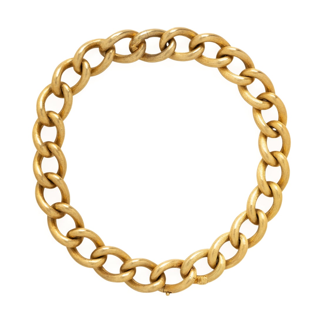 Convertible Yellow Gold Curb Link Necklace: Convertible Yellow Gold Curb Link Necklace Designed with curb links in a brushed finish, to be worn as bracelets or clasped together as a necklace. 18 karat yellow gold. Each 9 1/4 inches long as a br