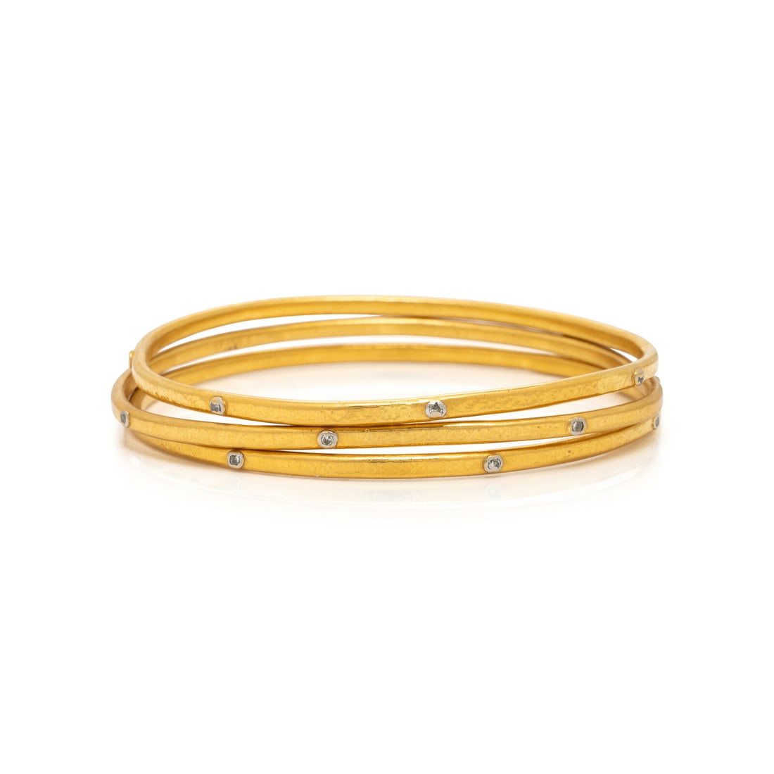 Gurhan, 'Hoopla', Three Yellow Gold and Diamond Bangle Bracelets: Gurhan, 'Hoopla', Three Yellow Gold and Diamond Bangle Bracelets Featuring round brilliant cut diamonds weighing approximately 0.30 carat total, in hammered gold finish. Mounted in white gold and 24