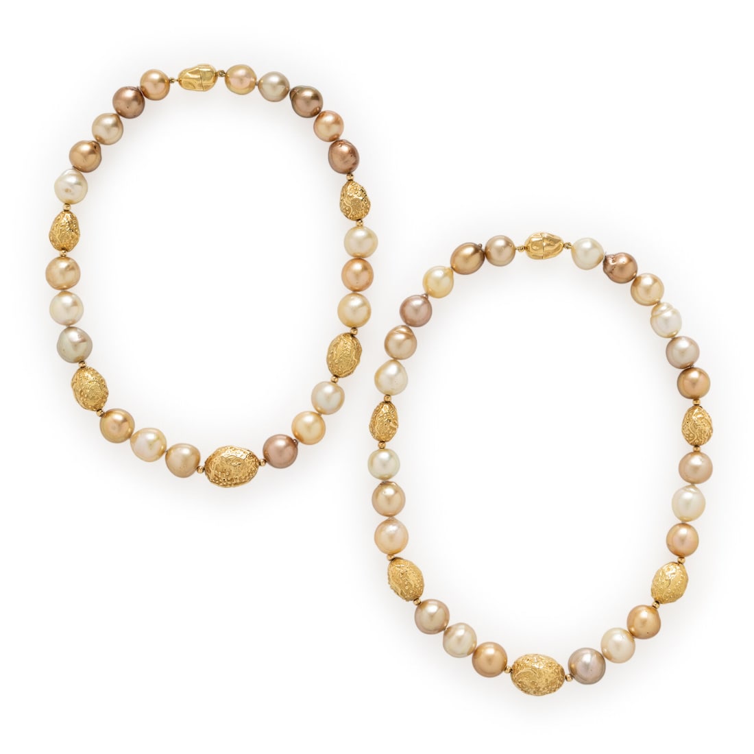 Yvel, Pair of Convertible Semi-Baroque Golden Cultured Pearl and Yellow Gold Necklaces: Yvel, Pair of Convertible Semi-Baroque Golden Cultured Pearl and Yellow Gold Necklaces Two strands of semi-baroque golden cultured pearls (origin of color not tested) measuring approximately 11.30 -
