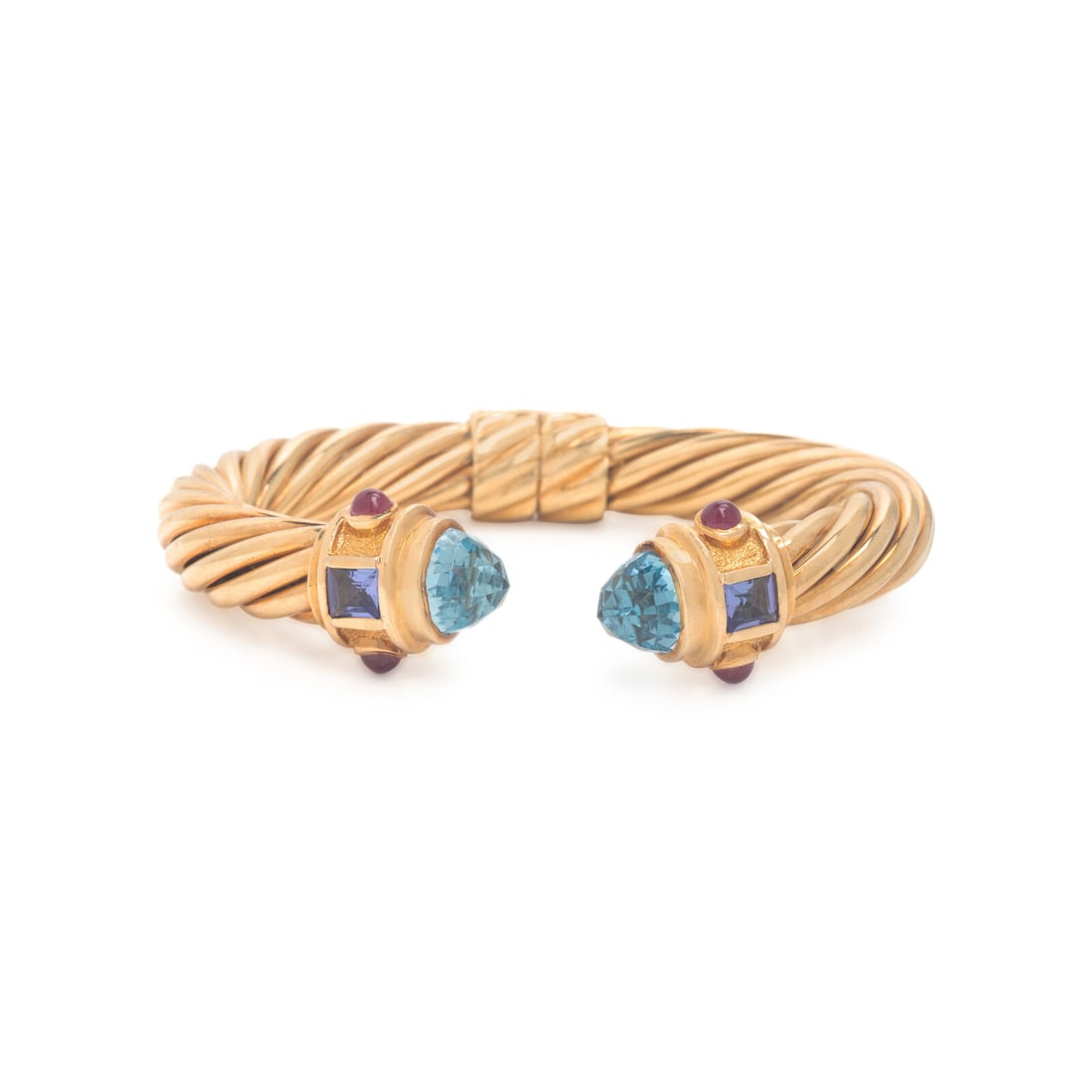 David Yurman, 'Renaissance Cablespira', Multigem and Yellow Gold Cuff Bracelet: David Yurman, 'Renaissance Cablespira', Multigem and Yellow Gold Cuff Bracelet Featuring faceted round blue topaz, princess cut tanzanite, and round cabochon rubies, hinged at the back. Mounted in 18