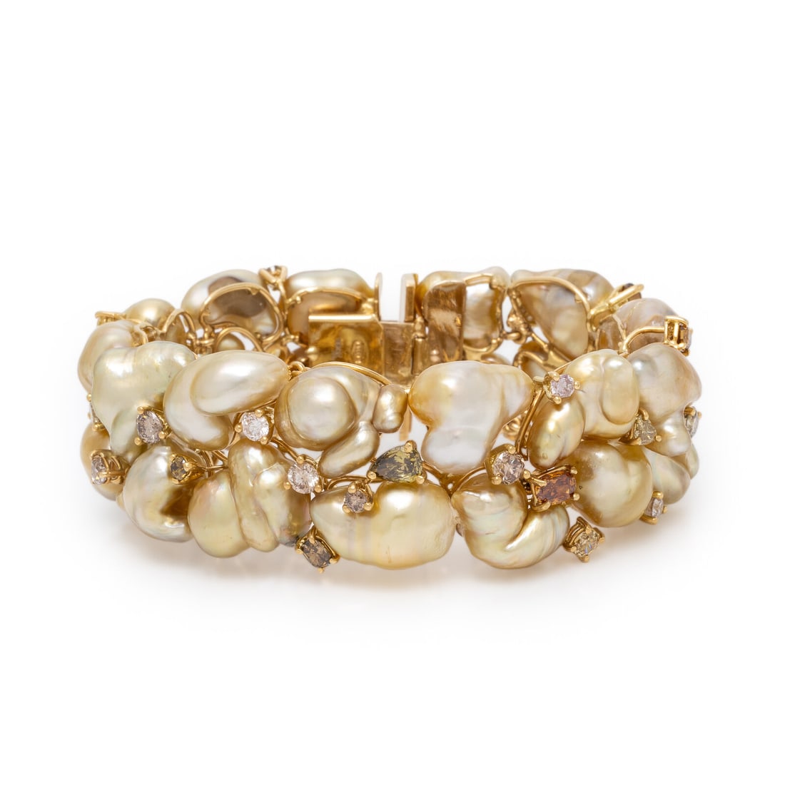 Yvel, Golden Baroque Cultured Pearl, Colored Diamond, and Yellow Gold Bracelet: Yvel, Golden Baroque Cultured Pearl, Colored Diamond, and Yellow Gold Bracelet Featuring golden baroque cultured pearls measuring approximately 9.60 x 11.40 x 9.15 - 16.20 x 12.10 x 10.00 mm (origin o