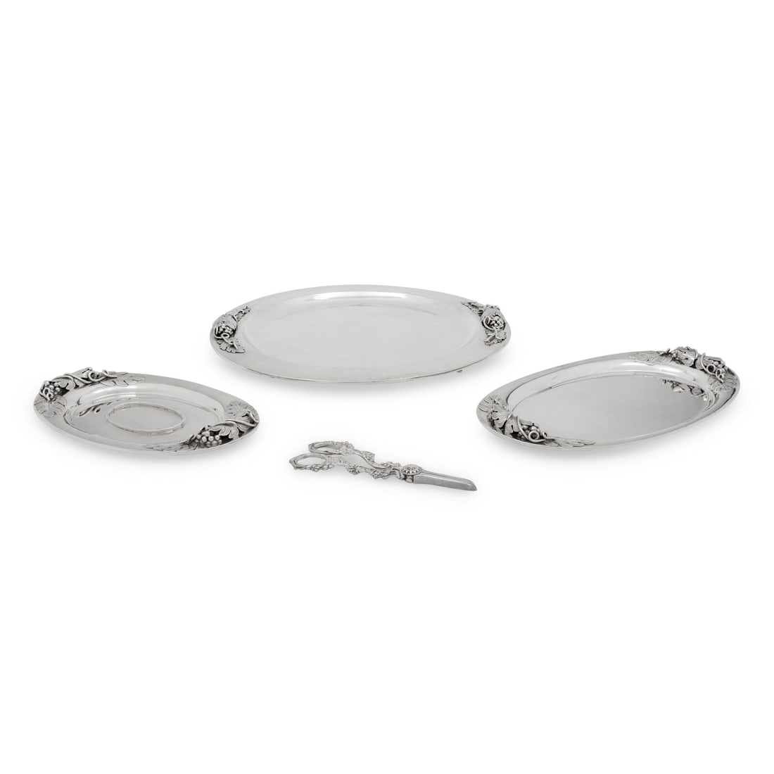 Three Mexican Silver Trays: Three Mexican Silver Trays 20th Century each stamped for Sterling to the underside; together with a pair of English silver-plate grape shears. 66 ozt 12 dwt weighable Diameter of largest 14 1/2 inches