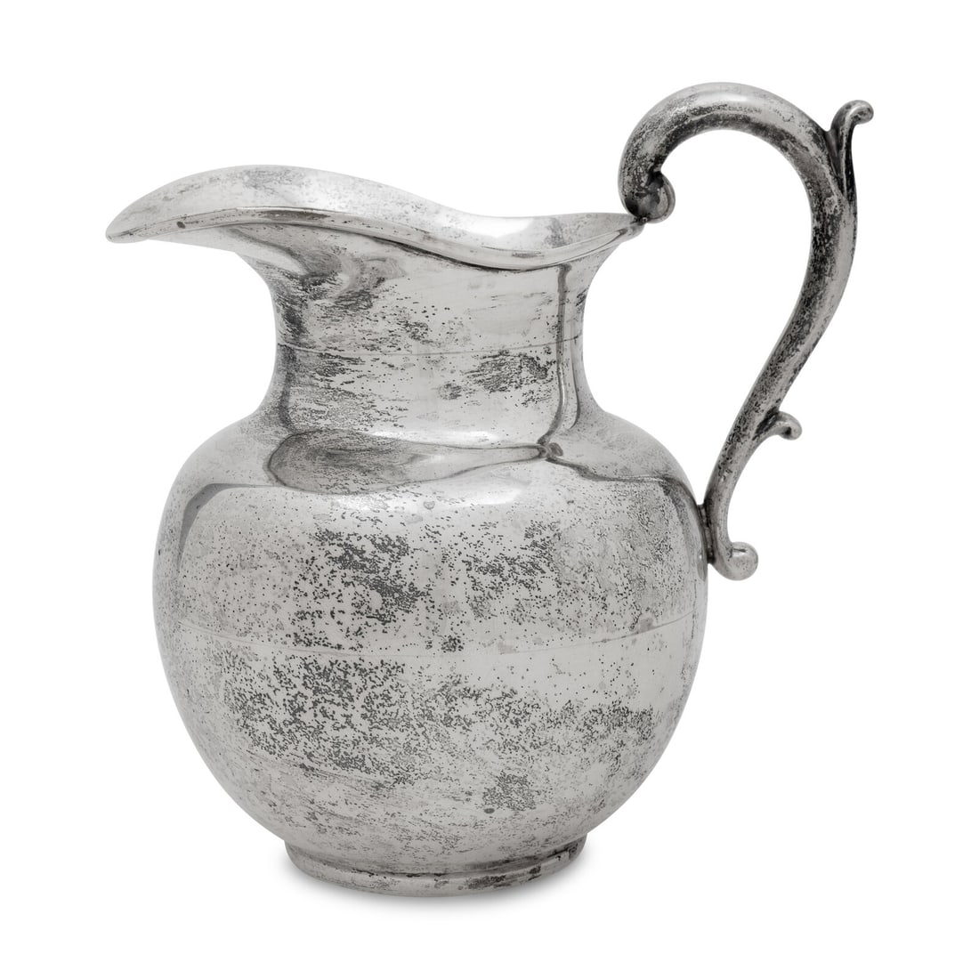 A Mexican Silver Water Pitcher: A Mexican Silver Water Pitcher C. Zurita, 20th Century marked 'Sterling' to the underside 22 ozt 2 dwt Height 8 inches. This lot is located in Chicago.