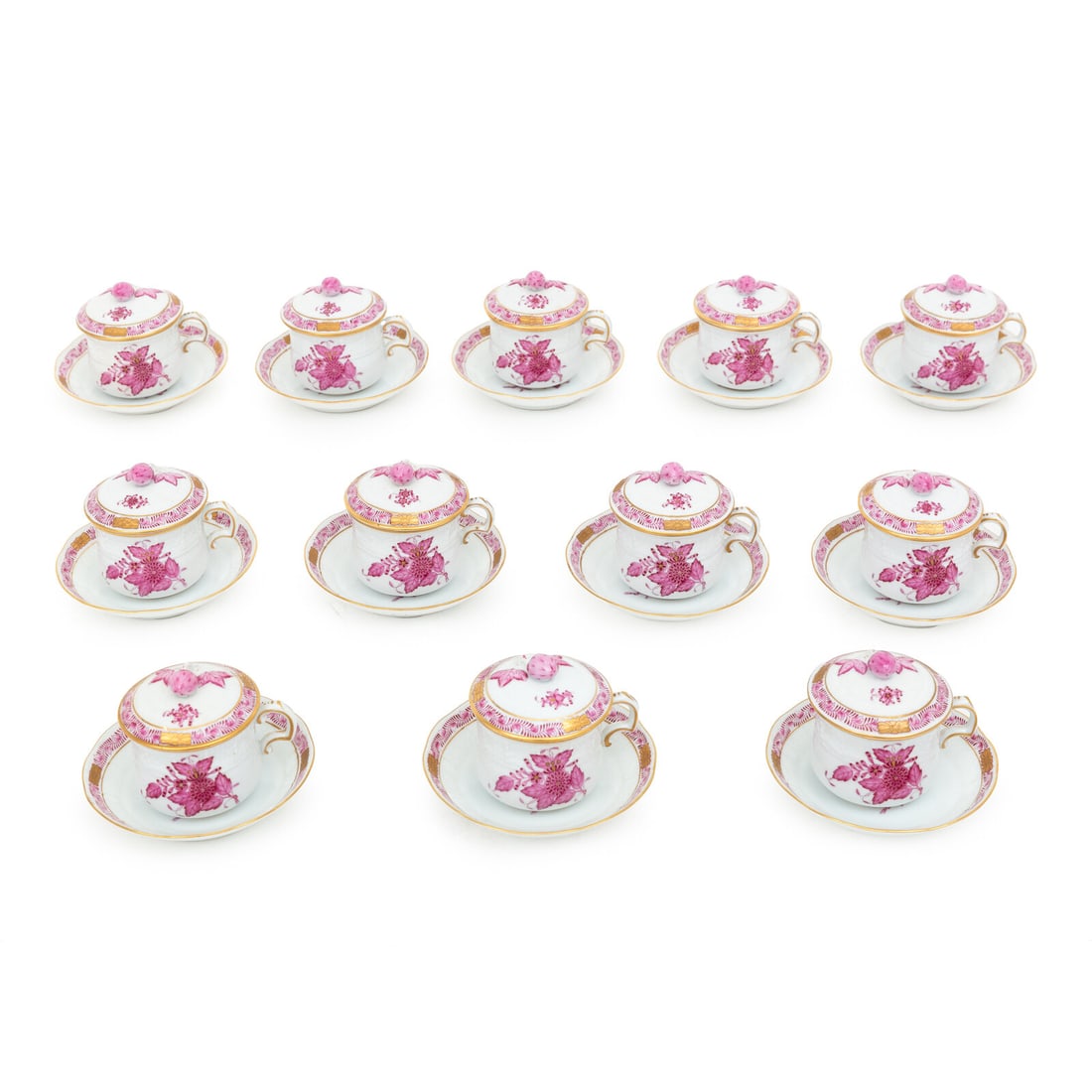 A Set of Twelve Herend Chinese Bouquet Porcelain Pots-de-Crèmes and Saucers: A Set of Twelve Herend Chinese Bouquet Porcelain Pots-de-Crèmes and Saucers 20th Century Height 3 1/4 inches. This lot is located in Palm Beach.