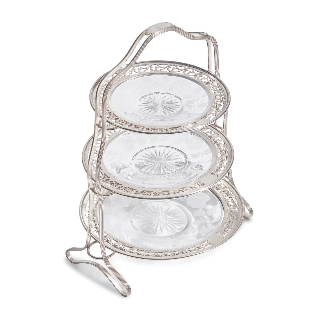 A Tiffany and Co. Silver Three-Tiered Cake Stand: A Tiffany and Co. Silver Three-Tiered Cake Stand New York, NY, Early 20th Century marked with numbers 1102, 1103 and 1104; the reeded frame holding three reticulated dishes, each with original etched 