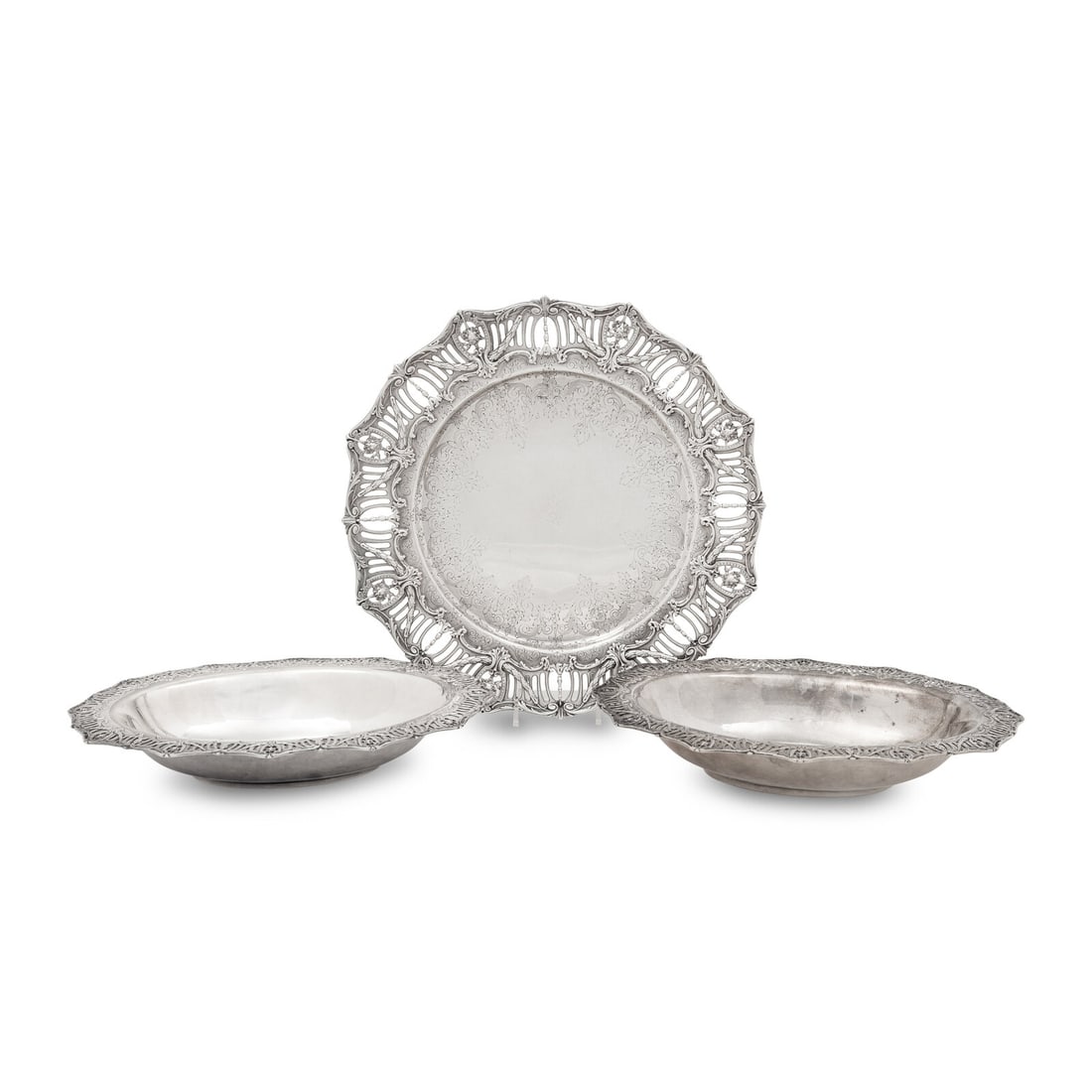 A Group of Three Tiffany and Co. Silver Serving Articles: A Group of Three Tiffany and Co. Silver Serving Articles New York, 20th Century Comprising a pair of vegetable dishes and a salver. Each stamped Tiffany & Co., Sterling. Smaller, length 12 inches; lar