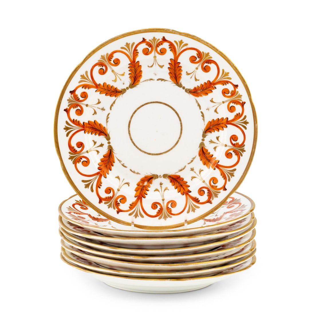 A Set of Eight Staffordshire Porcelain Plates: A Set of Eight Staffordshire Porcelain Plates 19th Century with iron red glaze and gilt decoration; unmarked. Diameter 9 7/8 inches. Property from the Collection of Patricia and Michael Corbett, Kenil