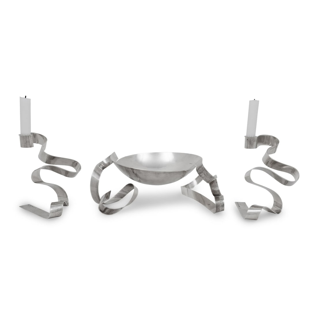 An English Silver Modernist Table Garniture: An English Silver Modernist Table Garniture Ane Christensen, London, 2004 comprising a center bowl and a pair of candlesticks. each hallmarked for Sterling 75 ozt 3 dwt gross Height of bowl 5 3/4 x
