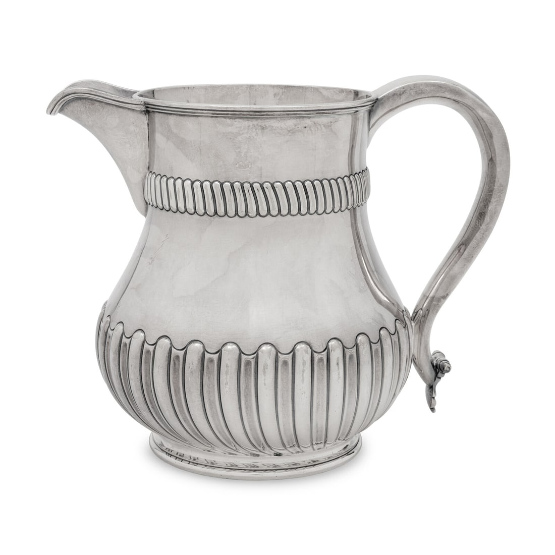 An English Silver-Plate Water Pitcher: An English Silver-Plate Water Pitcher 20th Century Height 7 1/2 inches. This lot is located in Chicago.