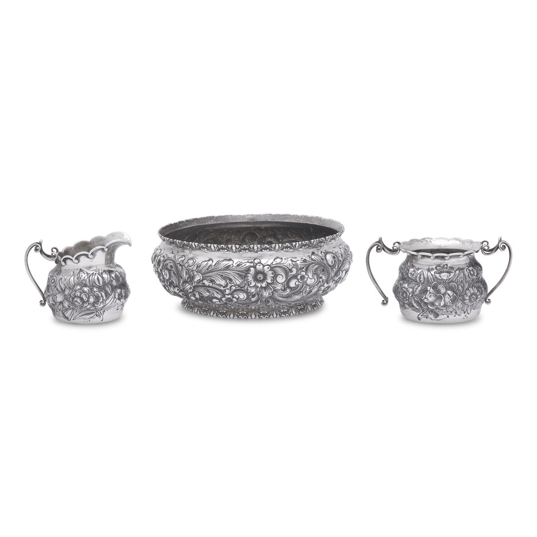 Three American Silver Floral Repoussé Table Articles: Three American Silver Floral Repoussé Table Articles Various Makers, Late 19th/Early 20th Century comprising a bowl, by William B. Durgin Co., Concord, New Hampshire and Providence, Rhode
