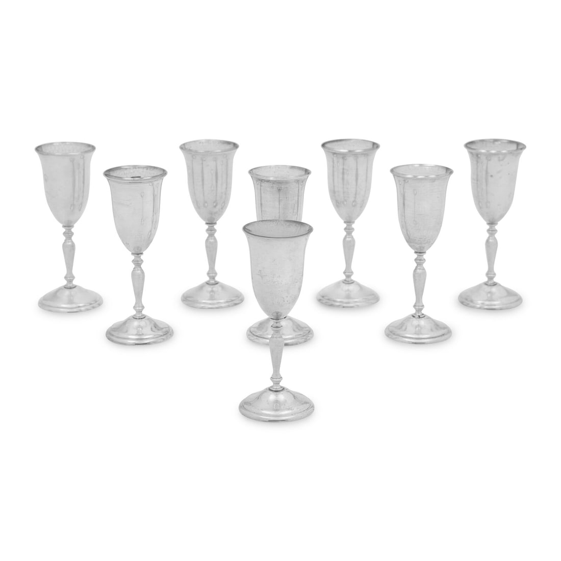 A Set of Eight American Arts and Crafts Silver Cordials: A Set of Eight American Arts and Crafts Silver Cordials The Randahl Shop, Chicago, IL, 20th Century each marked 'Sterling' to the underside 12 ozt 5 dwt Height 4 1/4 inches. Property from an