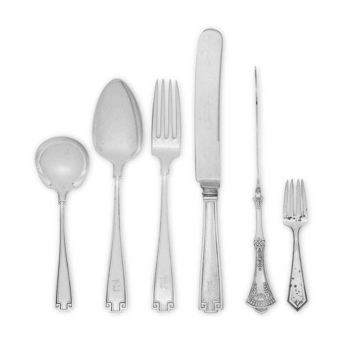 An American Silver Flatware Service: An American Silver Flatware Service Gorham Mfg. Co., Providence, Rhode Island, 20th Century Etruscan pattern, comprising: 9 dinner forks 10 teaspoons 6 soup spoons 6 tablespoons 11 knives; together