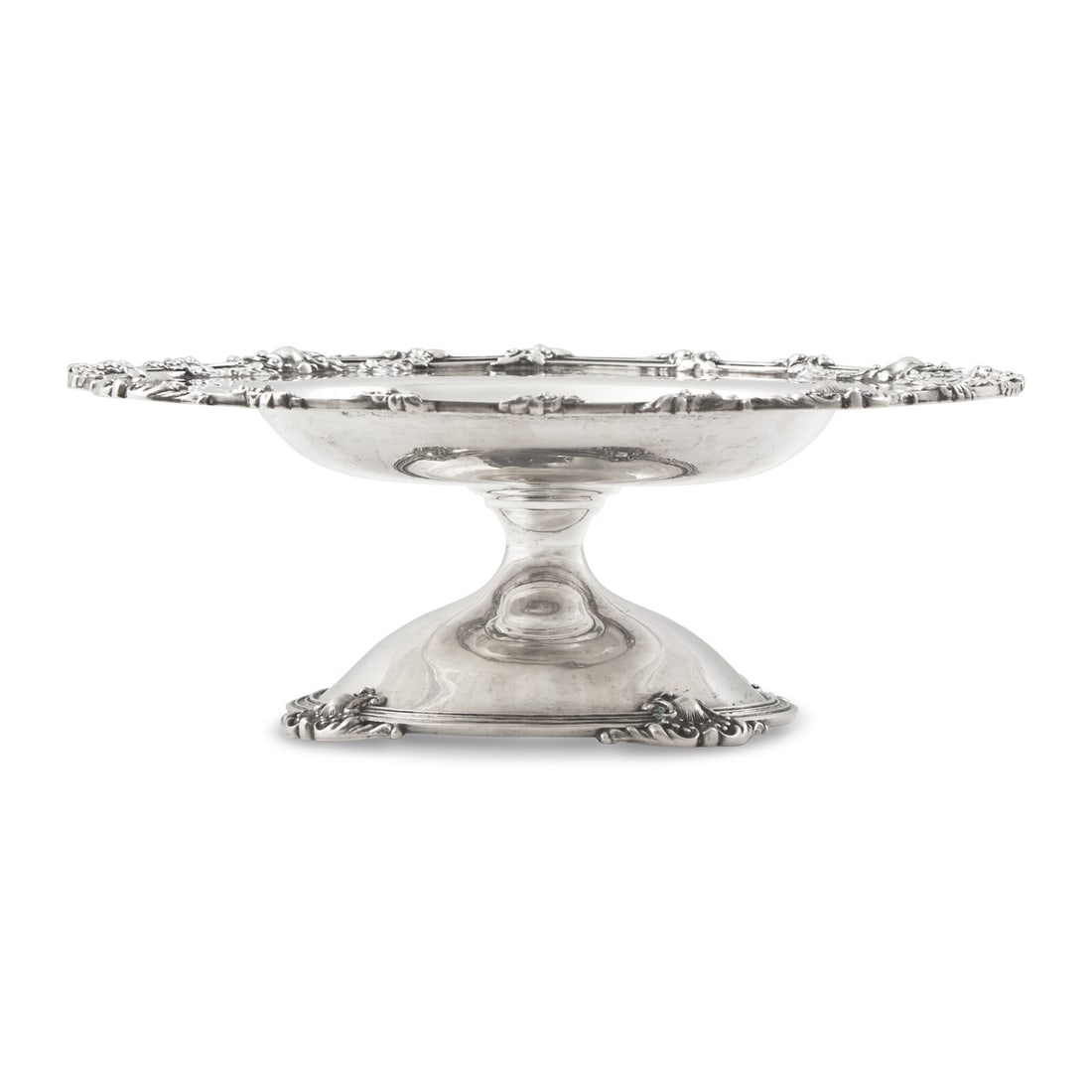 An American Silver Compote: An American Silver Compote Redlich and Co., New York, NY, 20th Century Retailed by J.E. Caldwell and Co., Philadelphia, the rim engraved with monogram, "FCF", marked to underside. 10 ozt 17 dwt